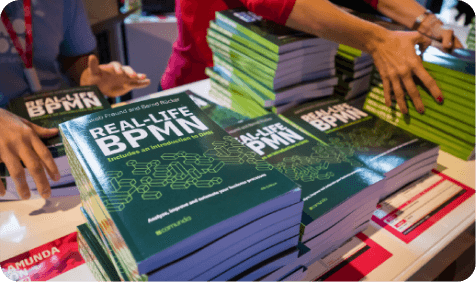 real-life bpmn books stacked